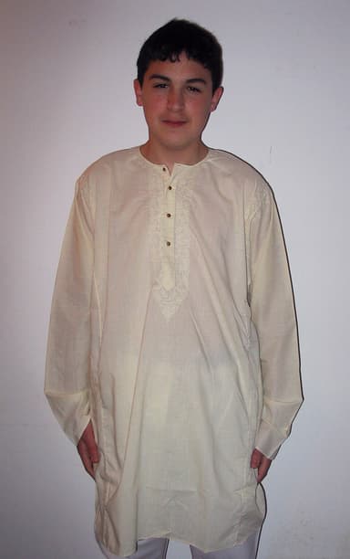Man wearing a cream kurta