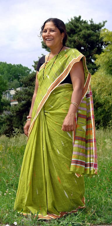 Woman wearing a green cotton sari